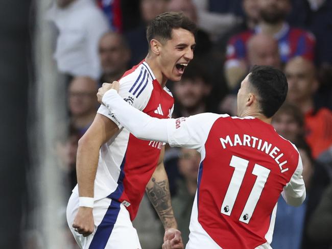 Jakub Kiwior (left) celebrates scoring Arsenal’s opener. Picture: Ian Walton/AP Photo