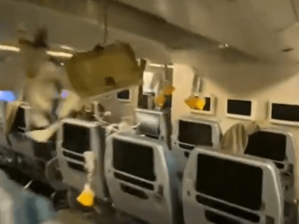 Terrifying footage of fatal turbulence that left elderly passenger dead and 71 injured