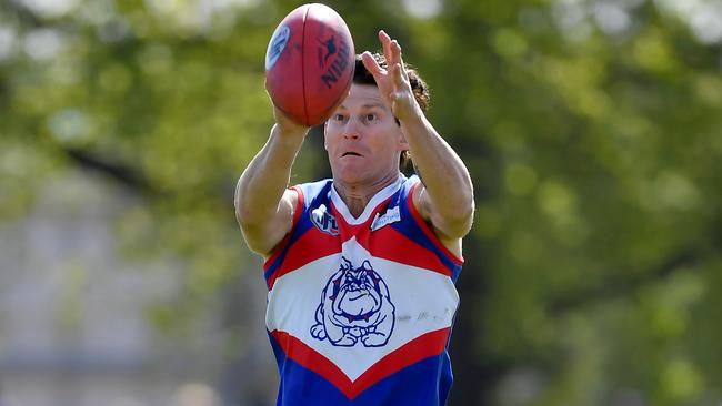 Shane Harvey takes a mark for North Heidelberg. Picture: Andy Brownbill