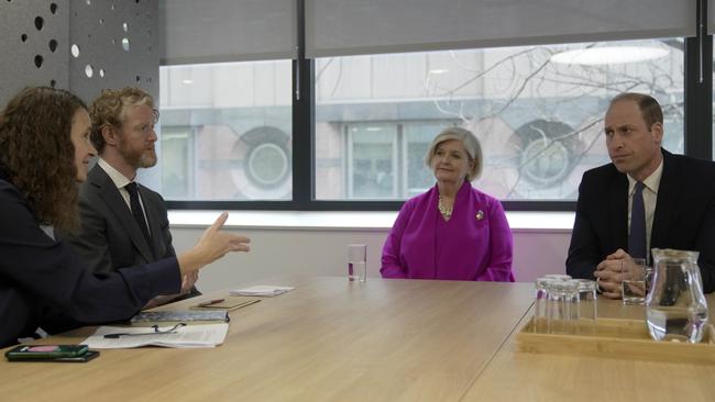 Prince William and chair Liz Padmore listen to Rory Moylan, Head of Region MENA and Europe, second left, and Clare Clement, Director of International Law and Policy. Picture: Getty Images