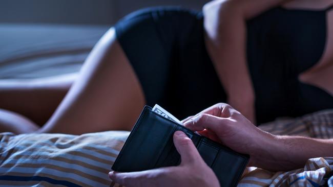 KATE UREN STORY:  Sex Worker. Escort. Cash. Woman. istock Escort or paid woman lying on bed in brothel. Man paying money for sex worker at night. Hooker with customer. Sexy lady with sugar daddy. Prostitution concept. Private striptease show. Picture: istock