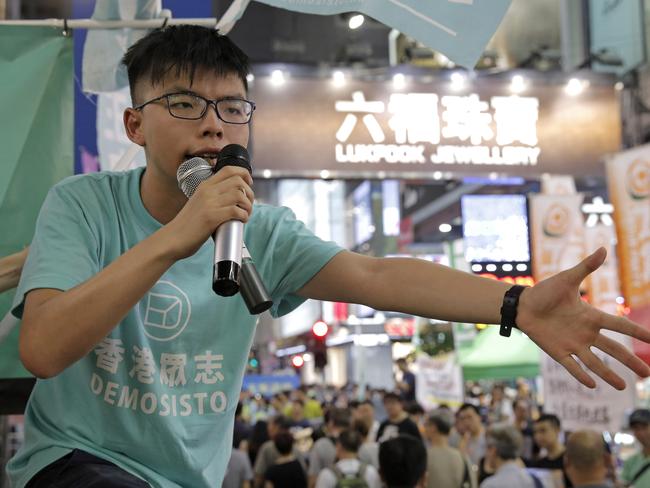 Hong Kong student activist Joshua Wong has vowed to keep campaigning against a tough new security law which permits extradition to China or long jail terms. Picture: AP