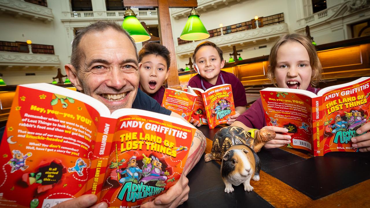 Author Andy Griffiths with his new series, Adventures Unlimited: The Land of Lost Things. Andy is joined by students from DInjarra Primary School Kingston Bui (9), Jack Norriss (9) and Maisie Ellis (9). Picture: Jake Nowakowski