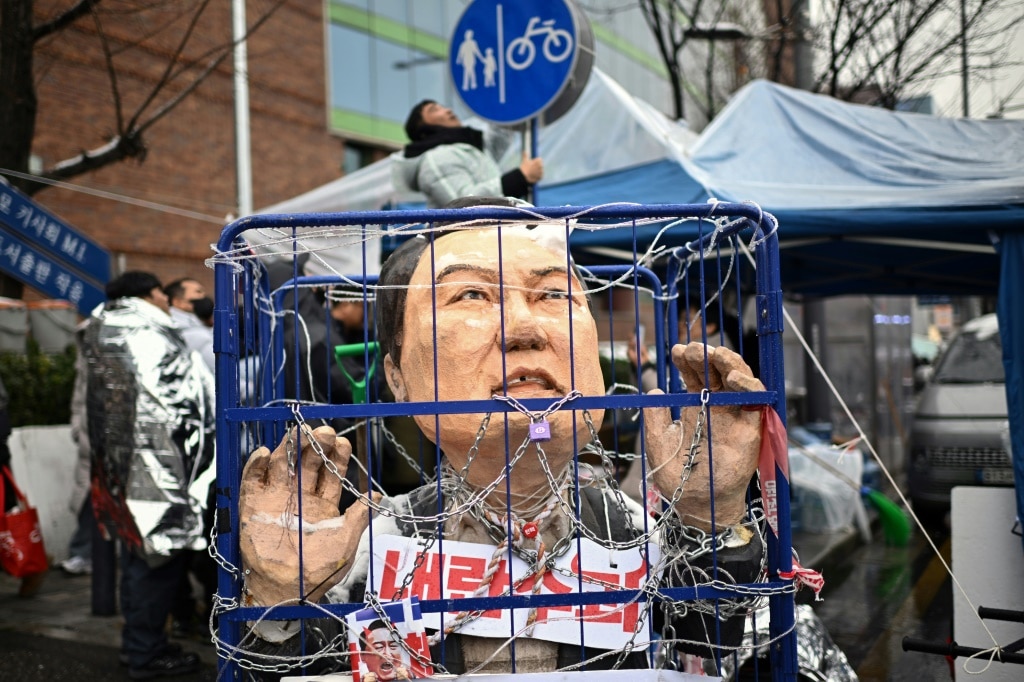 South Koreans protest in snow as Yoon arrest deadline nears