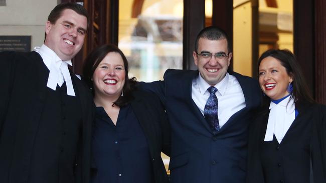 Faruk Orman walks free from the Melbourne court of appeal with his legal team Paul Smallwood, Ruth Parker and Carly Marcs Lloyd. Picture: Aaron Francis