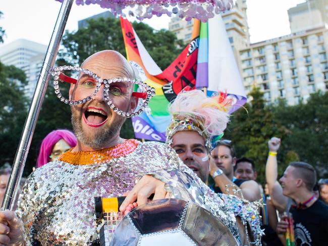 A parade entrant poses for the camera in the marshalling area in Hyde Park at the 2016 Sydney Gay & Lesbian Mardi Gras.