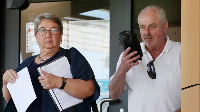 Edith van Dommelen, 68, and Lawrence Gordon Petersen, 63, leave the Richlands Magistrates Court after being charged with fraud and failing to comply with border directions. Picture: Tara Croser.