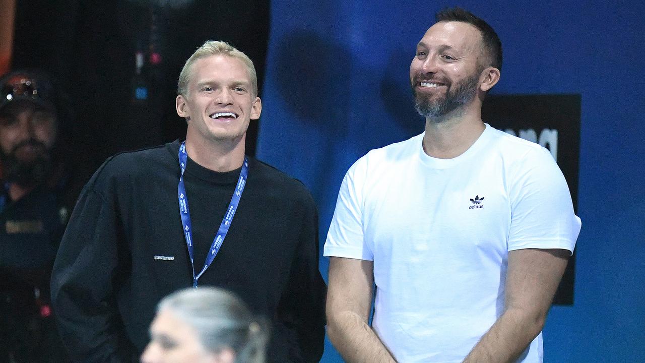 Cody Simpson with Ian Thorpe during the Aussie swimming championships on the Gold Coast. Picture: AAP Image/Dave Hunt.