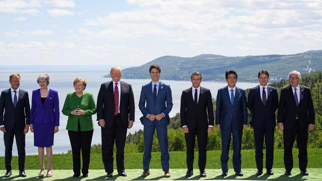 The nine leaders (l-r) European Union Council President Donald Tusk, British Prime Minister Theresa May, German Chancellor Angela Merkel, US President Donald Trump, Canadian Prime Minister Justin Trudeau, French President Emmanuel Macron, Japanese Prime Minister Shinzo Abe, Italian Prime Minister Giuseppe Conte and European Union Commission President Jean-Claude Juncker. Picture: Leon Neal/Getty Images/AFP