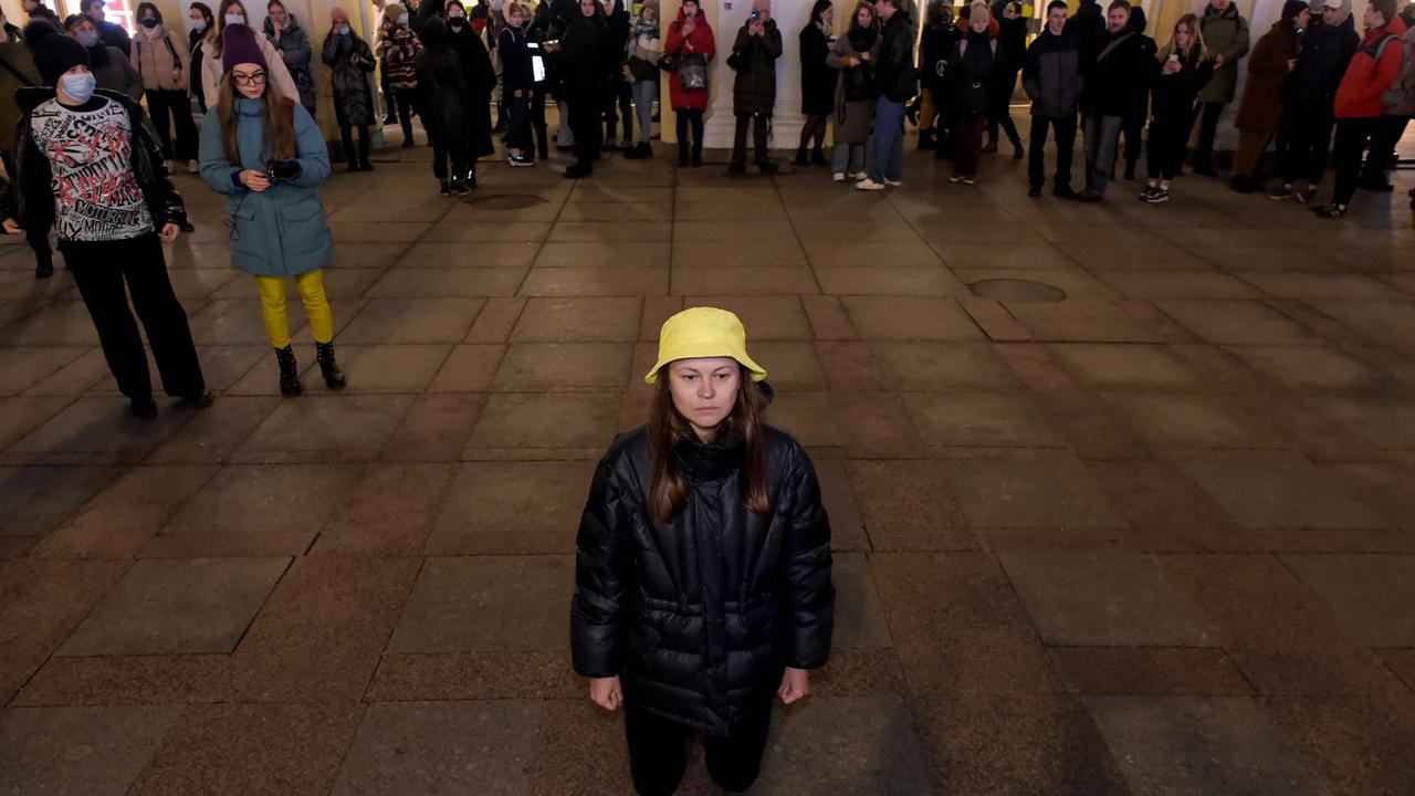 Demonstrate on her knees during a protest against Russia's invasion of Ukraine in central Saint Petersburg. Picture: Olga Maltseva / AFP