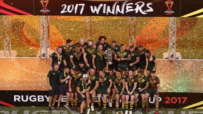 The Kangaroos celebrate with the trophy after winning the 2017 Rugby League World Cup Final.