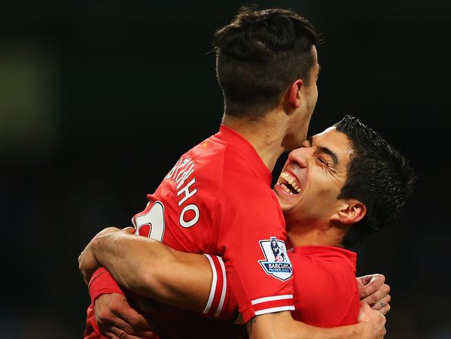 Luis Suarez and Philippe Coutinho. (Photo by Alex Livesey/Getty Images)