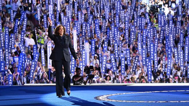 US Vice President and 2024 Democratic presidential candidate Kamala Harris waves as she arrives to speak on the fourth and last day of the Democratic National Convention.