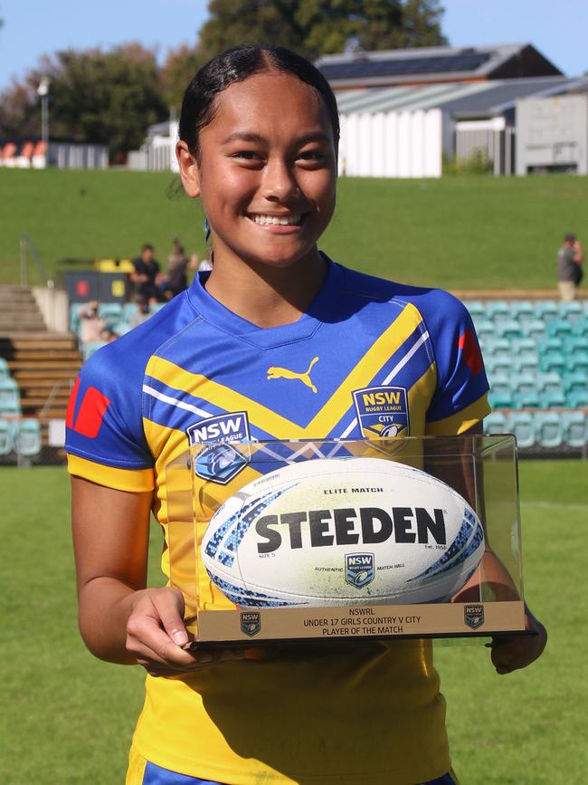 City fullback Logan Lemusu with the player of the match award. Picture: Warren Gannon Photography