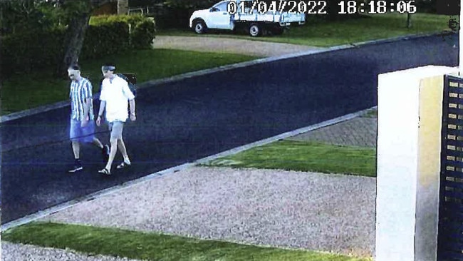 Jason Struhs (left, blue shorts) and Sebastian Stevens (white shirt) leave the house seven minutes later. Picture: Supplied