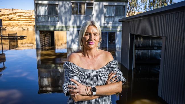 Sara Adams, at her flooded shack at Blanchetown, is one the homeowners not eligible for the free vaccine. Picture: Tom Huntley