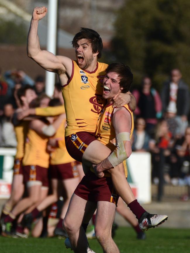 Elation: League best-and-fairest winner Nikolaus Rokahr and teammate Jonty Wardle celebrate Shepparton’s grand final win — the first since 2000 — after the siren. Picture: Bailey Opie