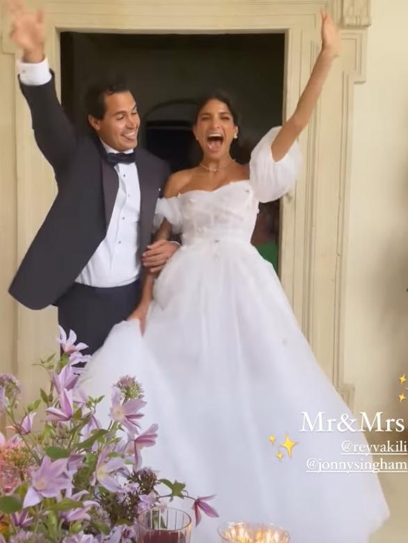 A jubilant Johnny Ingham and Rey Vakili enter their reception. Picture: Instagram/Montarna Pitt