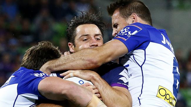 Round 6 - Melbourne Storm v Canterbury Bulldogs, at AAMI Park, Cooper Cronk tackled high by Josh Reynolds with no penalty. 11th April 2016. Picture: Colleen Petch.