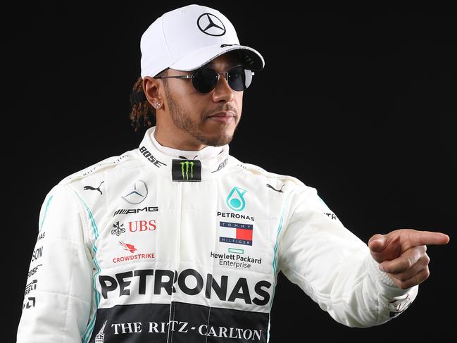 MELBOURNE, AUSTRALIA - MARCH 12: Lewis Hamilton of Great Britain and Mercedes GP poses for a photo in the Paddock during previews ahead of the F1 Grand Prix of Australia at Melbourne Grand Prix Circuit on March 12, 2020 in Melbourne, Australia. (Photo by Robert Cianflone/Getty Images)