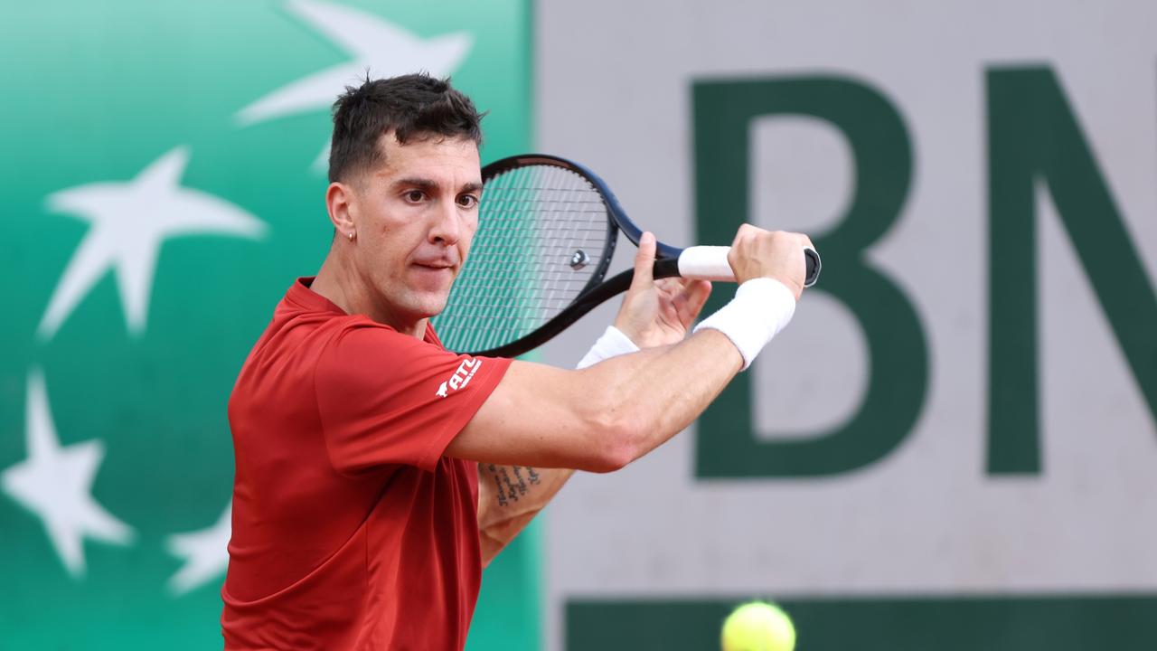 PARIS, FRANCE – MAY 30: Thanasi Kokkinakis of Australia plays a backhand against Giulio Zeppieri of Italy in the Men's Singles second round match during Day Five of the 2024 French Open at Roland Garros on May 30, 2024 in Paris, France. (Photo by Dan Istitene/Getty Images)