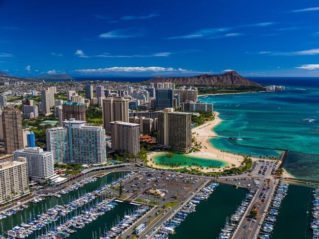 WAIKIKI BEACH Hawaii’s most well-known beach, Waikiki Beach spans 3.2km long and is made up of eight different beaches. Sunseekers favour Duke Kahanamoku Beach, named after the Hawaiian surfing legend and Olympic champion. The Hilton Hawaiian Village lagoon is conveniently a stone’s throw away. Picture: Hawaii Tourism Authority / Tor Johnson