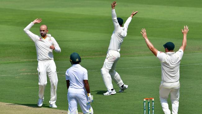 Nathan Lyon removes Asad Shafiq. Picture: AFP