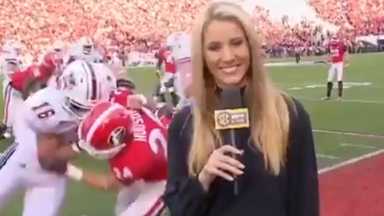 Sideline reporter hit in college football tackle | news.com.au ...