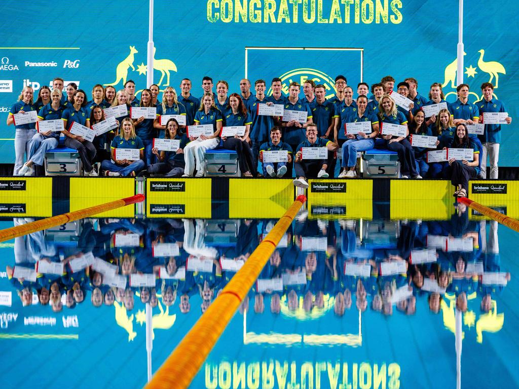 Members of the Australian swimming team for the 2024 Paris Olympic Games pose for a group photograph after the Australian Swimming Trials at the Brisbane Aquatic Centre on June 15, 2024. (Photo by Patrick HAMILTON / AFP) / -- IMAGE RESTRICTED TO EDITORIAL USE - STRICTLY NO COMMERCIAL USE --
