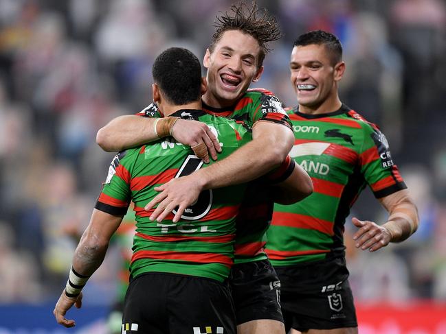 Cody Walker of the Rabbitohs (left) celebrates with Cameron Murray after scoring a try during the the Round 6 NRL match between the South Sydney Rabbitohs and the New Zealand Warriors at Bankwest Stadium in Sydney, Friday, June 19, 2020. (AAP Image/Dan Himbrechts) NO ARCHIVING, EDITORIAL USE ONLY