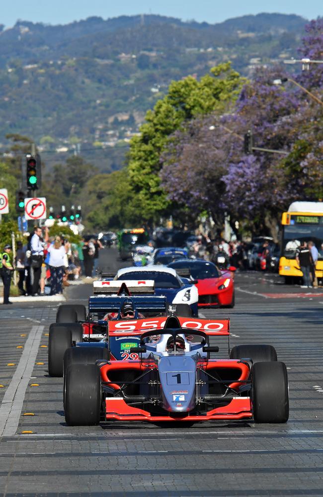 21 cars including Adelaide-era F1 cars drive along Wakefield Street as part of the Adelaide Motorsport Festival. Picture: Tom Huntley