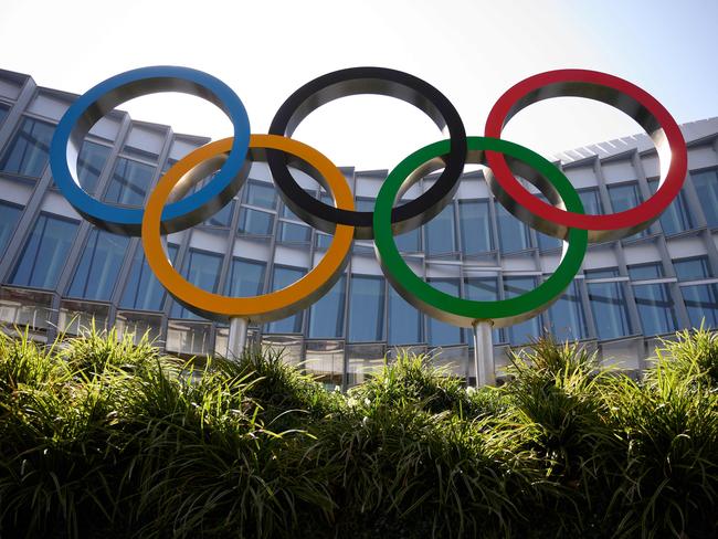 The Olympic Rings logo is pictured in front of the headquarters of the International Olympic Committee (IOC) in Lausanne on March 18, 2020, as doubts increase over whether Tokyo can safely host the summer Games amid the spread of the COVID-19. - Olympic chiefs acknowledged on March 18, 2020 there was no 