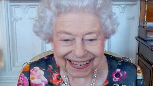 Queen Elizabeth II appears via video link from Windsor Castle during a virtual event to present The Queen's Gold Medal for Poetry to British poet David Constantine. Picture: Buckingham Palace / AFP.