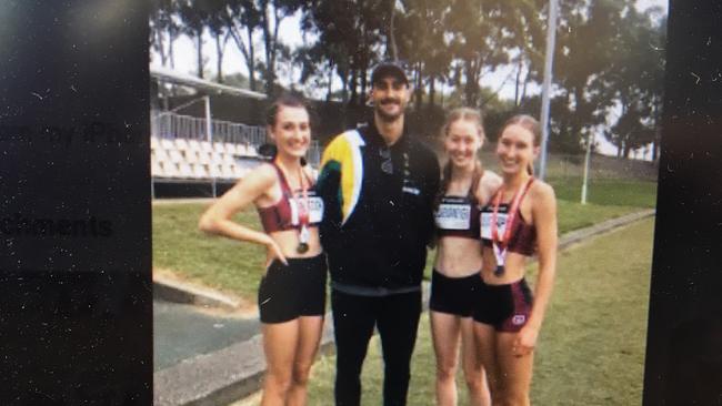 Francesca Peacock with her coach Konle and team mates from MBC