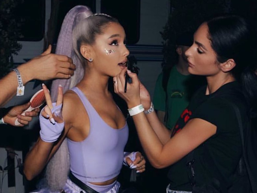 Ariana Grande backstage at Coachella, having her lipstick touched-up by Ash K Holm (right). Picture: Instagram