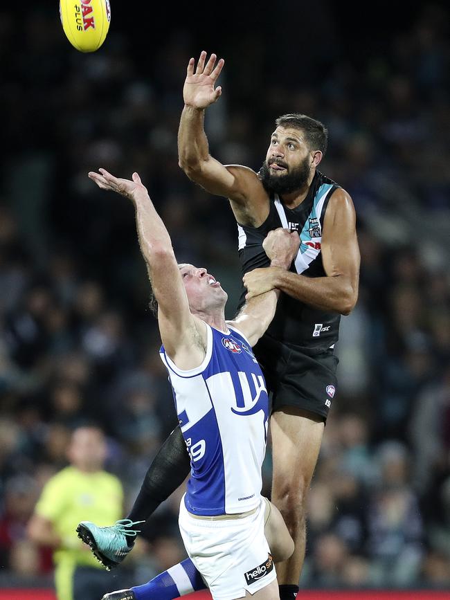 Paddy Ryder and Todd Goldstein n action during the Round 6 clash at Adelaide Oval. Picture SARAH REED