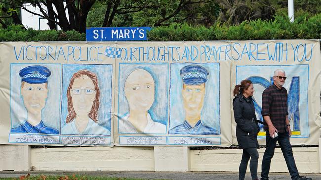 A mural dedicated to the four Victorian police officers who died is seen at St Mary's Primary School in Melbourne.