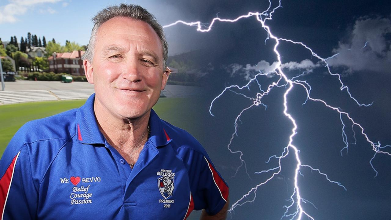 AFL great Doug Hawkins was rushed to hospital after being struck by lightning.