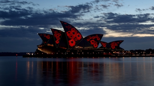 Poppies are projected onto the Sydney Opera House at first light to mark Remembrance Day. Picture: Brendon Thorne/Getty Images