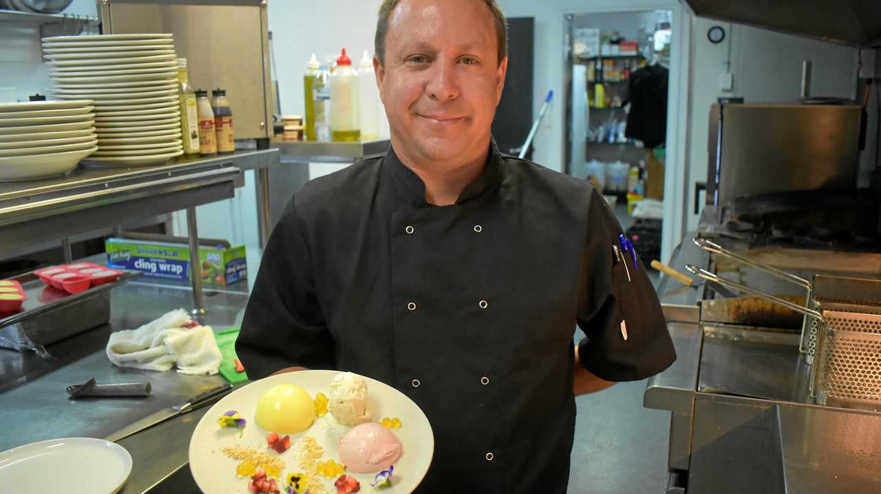 NEW MENU: Nathan McLellan, executive chef of BC's Bar and Grill, Roma, introduces a deconstructed mango and strawberry cheesecake to the new menu. Picture: Jorja McDonnell