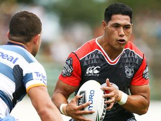 PALMERSTON NORTH, NEW ZEALAND - FEBRUARY 19: Roger Tuivasa-Sheck of the Warriors runs at Ash Taylor of the Titans during the NRL Trial match between the Warriors and the Gold Coast Titans at Central Energy Trust Arena on February 19, 2017 in Palmerston North, New Zealand. (Photo by Hagen Hopkins/Getty Images)