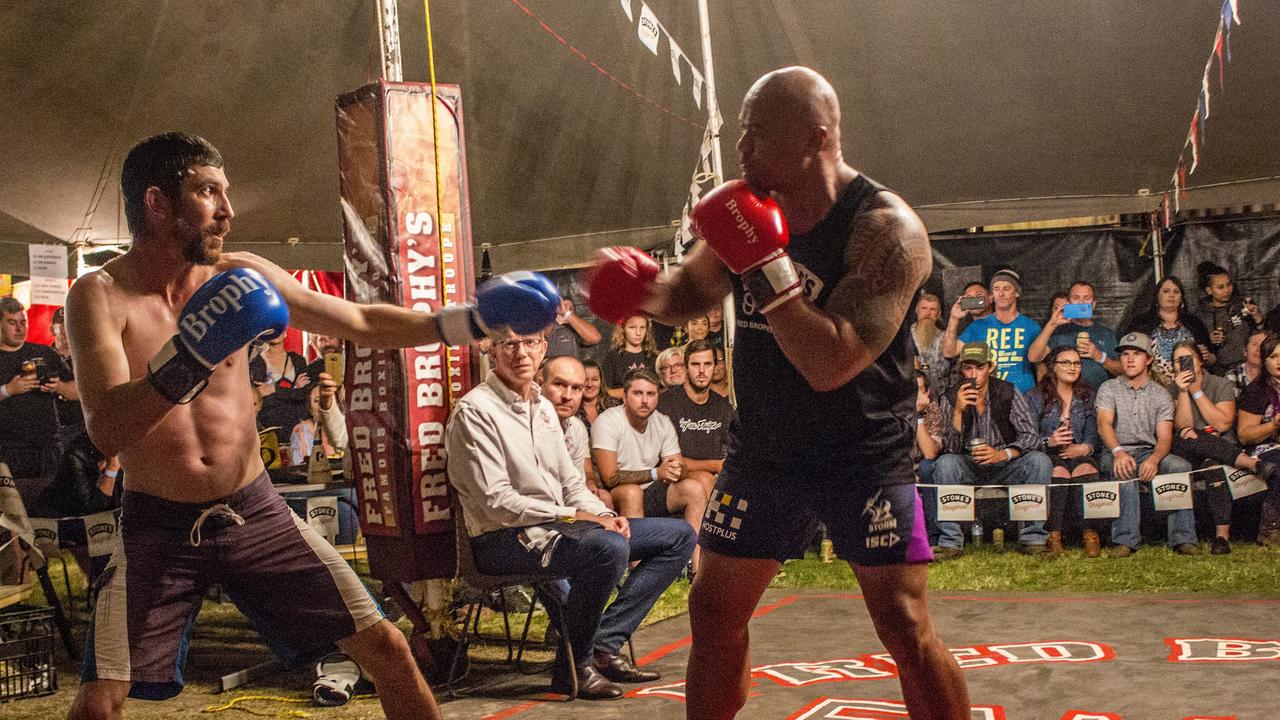 Paul Vicca fighting The Samoan at Fred Brophy's Boxing tent in Torbanlea