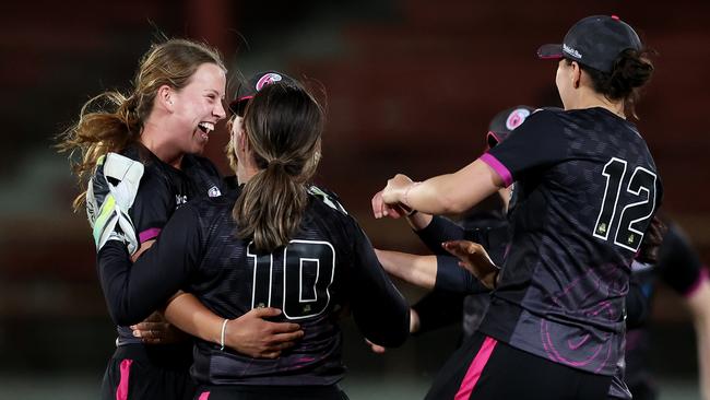 From Brewer Shield to Sydney Sixers: Greater Hunter Coast’s Caoimhe Bray (L) celebrates with Sixers teammates after taking a wicket at North Sydney Oval on October 12, 2024. (Photo by Matt King/Getty Images)