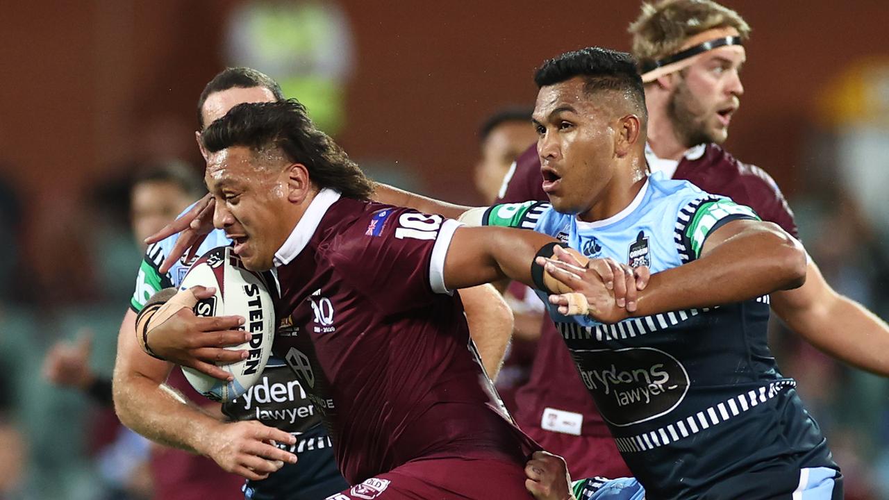 Laurie Daley expects a tough battle between Josh Papalii (with ball) and Daniel Saifiti). (Photo by Cameron Spencer/Getty Images)