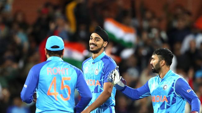 India have survived a late scare, to keep their finals hopes alive after claiming victory in a thriller against Bangladesh. AFP.