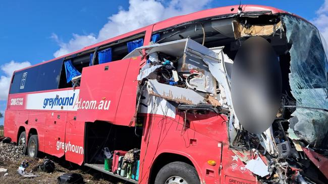 The bus was pushed onto nearby train tracks when it collided with the caravan. Picture: Supplied