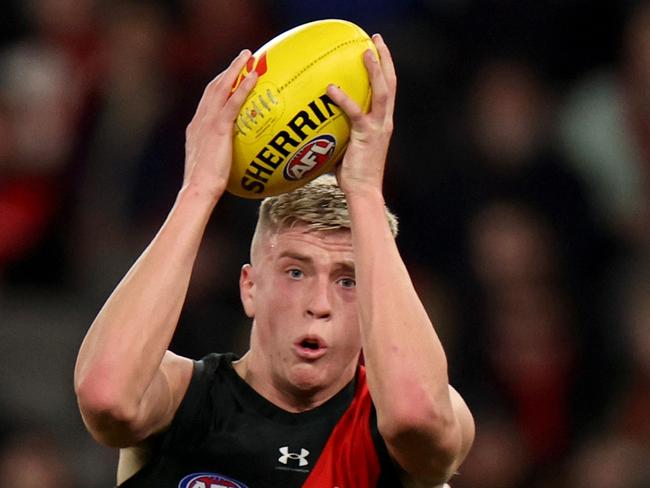 MELBOURNE, AUSTRALIA - AUGUST 10: Nate Caddy of the Bombers in action during the round 22 AFL match between Essendon Bombers and Gold Coast Suns at Marvel Stadium, on August 10, 2024, in Melbourne, Australia. (Photo by Jonathan DiMaggio/Getty Images)