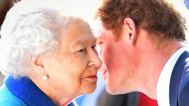 Queen Elizabeth II and Prince Harry at the Chelsea Flower show 2015. Picture: Getty Images)