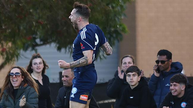 Alex Salmon celebrates a goal for Oakleigh Cannons.