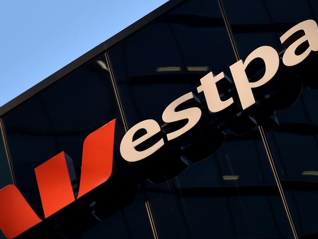 The Westpac sign is seen at their banking headquarters in Sydney on May 8, 2017.  Australian banking heavyweight Westpac posted a six percent rise in interim net profit to 2.89 billion USD on May 8, 2017 on the back of a strong performance from institutional operations. / AFP PHOTO / PETER PARKS